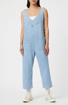 Rock a casual-cool vibe in this lightweight denim jumpsuit designed with front patch pockets and a cropped length. 23 1/2" inseam; 17 1/2" leg opening Side button closure Deep V-neck Sleeveless Front patch pockets 76% cotton, 24% rayon Machine wash, dry flat Made in Turkey Light Wash Overall Jumpsuit With Pockets, Light Wash Overall Jumpsuits And Rompers With Pockets, High Rise Denim Jumpsuit With Pockets In Utility Style, Medium Wash Relaxed Fit Denim Utility Jumpsuit, Utility Denim Blue Jumpsuit With Side Pockets, Casual Relaxed Fit Jumpsuits With Slip Pockets, Spring Overalls With Slip Pockets And Relaxed Fit, Medium Wash Relaxed Fit Denim Jumpsuit With Bib Front, Light Wash Cotton Jumpsuit With Pockets