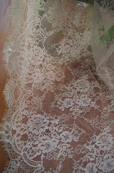 off white Chantilly lace fabric, French chantilly lace, retro wedding lace fabric with scalloped bor White Lace Dress With Scalloped Edges, Off White Lace With Lace Trim For Wedding, Elegant Vintage White Lace With Lace Trim, Off White Lace Dress For Wedding, Off White Lace Trim Wedding Dress, Vintage White Lace Patchwork For Wedding, Vintage White Wedding Lace, Vintage White Crochet Lace For Wedding, White Lace Dress With Contrast Lace For Wedding