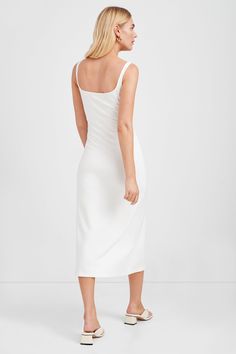 Glamorous in her minimalism, our Crawford Dress perfects the sleek silhouette for anytime, anyplace wear. Crawford's wide squared neckline with slim straps falls to a below-the-knee a-line silhouette, creating a flattering cut to dress up or dress down. From mid-stretch, structured European Ponte, she's wrinkle-resistant and comfortable—ready for your weekend bag or for days or nights out with friends. [SPLIT] Sam, in red, is 5'8" (173 cm) tall, wearing size XS. Maritza, in off white, is 5'9.5" Solid Dress With Straight Neckline For Date Night, Fitted Square Neck Slip Dress, Fitted Slip Dress With Square Neck, Elegant Square Neck Slip Dress With Adjustable Straps, Elegant Slip Dress With Adjustable Straps And Square Neck, Sleek Fitted Midi Dress With Square Neck, Sleek Fitted Square Neck Midi Dress, Sleek Square Neck Fitted Midi Dress, Square Neck Midi Dress For Date Night