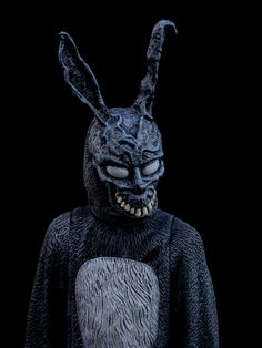 an image of a creepy rabbit mask on a black background