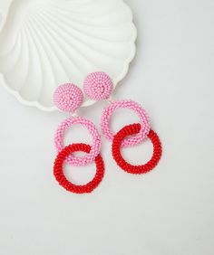 Pink and Red Hoop earrings. Ideal for evening and daily look. Round dangles earrings made of high-quality beaded and rings. CUSTOM ORDER It is Fully HANDMADE earrings and if you want to purchase this earring in a different color or size, send me please a direct message. If you have any questions don't hesitate to ask me. Please visit my shop to see more models made by me https://www.etsy.com/shop/LaranBijou DIMENSIONS Length - 8cm (3inch) Weight 15 grams Clip-On earrings Stud earrings SHIPPING I Trendy Red Circular Jewelry, Pink Small Hoop Beaded Earrings As Gift, Red Hoop Earrings For Summer, Trendy Pink Hoop Earrings With Round Beads, Red Round Beaded Party Earrings, Trendy Red Hoop Earrings, Pink Hoop Beaded Earrings, Red Small Hoop Earrings For Summer, Pink Hoop Earrings With Colorful Beads