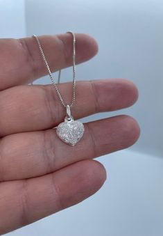 This beautiful heart charm necklace makes a perfect gift for that special person in your life and also a great gift for lovers of modern and minimalist jewelry. 💕 Approximately 1mm box chain (choice your length) Pendant  Height: 10.7mm Width: 11.8mm Thickness: 4.4mm Bail opening: 4mm Metal: 925 Sterling Silver ⭐️Free silver polishing cloth  ⭐️ It's completely natural for sterling silver to oxidize over time when it's exposed to air. Please, keep them in airtight plastic bag and use sterling sil Valentine's Day Heart Pendant Necklace With Box Chain, Valentine's Day Heart Necklace With Box Chain, White Gold Charm Necklaces With Box Chain For Gift, White Gold Charm Necklace With Box Chain As Gift, Gift Heart Pendant Jewelry With Box Chain, White Gold Box Chain Charm Necklace For Gift, Heart Pendant Necklace With Box Chain As Gift, Heart Pendant Necklace With Box Chain For Gift, Valentine's Day Gift Heart Necklace With Box Chain