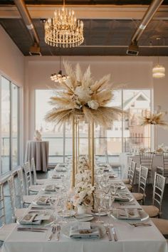 These beautiful Centerpieces for you special day.  This centerpiece will include the following:  50 pcs pampas Grass (these will need to be fluffed upon receipt!) 12pc Ivory rose silk floral stems 6 stems of baby breaths 1 x Foam Cup and a 32" Or 24"  Flat Gold stand (Choose the color drop down menu) Needs to be assembled upon arrival!  Just note the height may vary depending how you arrange the pampas! and the size of stand you select.  not all arrangements, will look as the listing as you are Pampas Grass Centerpieces, Grass Centerpieces, Loft Wedding Reception, Pampas Arrangement, Grass Centerpiece, Beautiful Wedding Decor, Tafel Decor, Loft Wedding, Beige Wedding