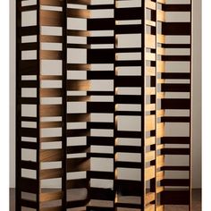 Amsterdam-based design duo Xander Vervoort and Leon van Boxtel designed this folding screen is created using remnant pieces of teak leftover from the creation of other designs. Handcrafted by traditional craftspeople in Bangalore, India in reclaimed or sustainably harvested teak scraps upcycled from the furniture production process for other pieces. Screen Room Divider Ideas, Wood Slat Screen, Kitchen Divider, Lotus Artwork, Bamboo Screen, Folding Windows, Lattice Screen, Folding Screen Room Divider, Bamboo Screening