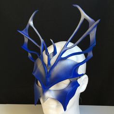 "Blue and Silver Mardi Gras mask, leather mask for Carnival, Masquerade Party, Poseidon costume, Triton, Water God, Water Fairy, or Mermaid costume. ORDER ANY COLOR For Halloween, Masquerade Ball, Carnival, Festivals, Renaissance Faire, Cosplay, Comicon, or Parade. Be King Triton! ♦ COMFORTABLE & ADJUSTABLE ♦ Secured with ties for adjustability, supple leather is formed to facial contours. SHOWN IN GLOSSY (Matte available by request.) ORDER ANY COLOR ♦ Match your costume, Free! -- Profession Fantasy Masks For Masquerade And Cosplay Events, Fantasy Style Masks For Masquerade And Cosplay, Fantasy Horned Masks For Masquerade, Medieval Style Masks And Prosthetics For Masquerade Cosplay, Medieval Style Masks For Cosplay And Masquerade Events, Fantasy Masks For Carnival Events, Fantasy Horned Masquerade Mask For Costume, Fantasy Masks For Carnival, Fantasy Masks For Cosplay Carnival