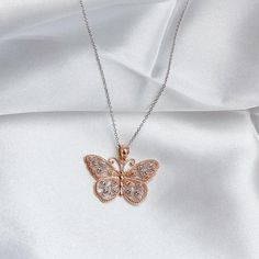 Give her the gift of wings with this beautiful butterfly necklace.DETAILS- 14k rose gold butterfly with rhodium plating- Chain option is 14k gold- Chain style may vary slightly- Approximately 1 inch wide x 3/4 inch tall (including bail)VARIATIONSIf you require any variation of this style (a different style chain, longer chain, etc.) feel free to message us. We will do our best to accommodate you. Additional costs may apply depending on the variation.POLICYWe do accept returns on this item minus Fine Jewelry Rose Gold Butterfly Charm, Elegant Rose Gold Jewelry With Butterfly Clasp, Rose Gold Butterfly Fine Jewelry, Rose Gold Sterling Silver Butterfly Necklace, Elegant Rose Gold Jewelry With Butterfly Charm, Rose Gold Sterling Silver Butterfly Necklace Gift, Rose Gold Sterling Silver Butterfly Necklace Perfect For Gifts, Butterfly Shaped Rose Gold Jewelry For Gifts, Butterfly Shaped Rose Gold Jewelry Gift