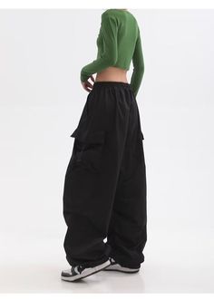 Features: Introducing the Women Punk Cargo Pants, perfect for the fashion-forward. Designed with a high waist and wide leg, these pants not only provide a flattering fit but also add a touch of streetwear edge to your wardrobe. Made with lightweight material, these pants are perfect for the summer season. Upgrade your style with these American Retro-inspired trousers. Hip Hop Style Baggy Wide Leg Bottoms, Black Relaxed Fit Y2k Bottoms, Urban High Waist Bottoms For Streetwear, Y2k Black Relaxed Fit Bottoms, Black Y2k Relaxed Fit Bottoms, Urban High-waist Bottoms For Streetwear, Black Y2k Wide Leg Bottoms, Y2k High Waist Streetwear Pants, Y2k Style Black Wide Leg Bottoms