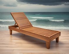 a wooden lounge chair sitting on top of a hard wood floor next to the ocean