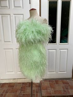 "Miki light green ostrich feather mini dress cocktail dress -Made to order -Please check my sizes chart before ordering -If it's doesn't fit with my size chart please measure your bust waist and hips -Dress made with ostrich feathers -Zipper closure on the back side -Straps can be taken off -Color: more than 18 colors -Dry clean only SGinstar Size Guide UK4/US0/EU32/AU4 Bust 31\"(78cm.) Waist24\"(60cm.) Hips33\"(83.5cm.) UK6/US2/EU34/AU6 Bust32\"(80.5cm.) Waist25\"(63cm.) Hips34\"(86cm.) UK8/US4 Green Mini Length Prom Dress, Chic Green Mini Dress For Prom, Green Mini Dress For Prom Season, Fitted Green Mini Dress For Wedding, Green Strapless Mini Dress For Cocktail, Glamorous Green Mini Dress For Prom Season, Glamorous Green Mini Dress For Prom, Green Mini Dress For Cocktail And Prom Season, Green Mini Dress For Cocktail During Prom Season