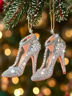 a pair of high heeled shoes hanging from a christmas tree