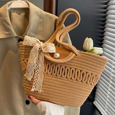 Add a touch of elegance to your beach days with our Straw Bags Beach Woven Pearl Bowtie Handbag Totes. These handbags feature a unique woven design and a chic bowtie detail accented with pearls. With plenty of storage space, you can easily carry all your beach essentials in style. Introducing our Straw Bags Beach Woven Pearl Bowtie Handbag Totes. Made from high-quality straw with a stylish woven design, adorned with a beautiful pearl bowtie. Perfect for your beach outings, providing both functionality and fashion. Elevate your summer look with this must-have accessory. Straw Beach Bag, Straw Bags, Beach Essentials, Silky Scarf, Woven Design, Bag Vintage, Beach Days, French Style, Styl Vintage