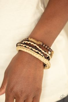 Mismatched strands of brown cording, braided leather, braided twine, and a wooden beaded bracelet layer across the wrist for an earthy look. Features an adjustable sliding knot closure.

 Sold as one individual bracelet. Wooden Beaded Bracelets, Bracelets Trendy, Sliding Knot Closure, Adjustable Sliding Knot, Brown Bracelet, Knot Bracelet, Sliding Knot, Paparazzi Accessories, Layered Bracelets