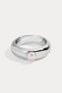 Final Sale cannot be returned or exchanged. Available in 14kt gold plated brass or Rhodium plated brass Stone is Pearl, and measures approx. 5.0mm Ring is true to size Product Care: METAL: Use a soft cloth to gently wipe clean, then remove any remaining impurities with mild diluted soap. Rinse with warm water and dry thoroughly before storing in the provided jewelry pouch. Do not use abrasive cleaners, steamers or ultrasonic machines. GEMSTONE: Avoid contact with perfumes, hairsprays or other ch Timeless Silver Pearl Ring With Polished Finish, Classic White Pearl Ring With Charm, Luxury Minimalist Pearl Ring, White Pearl Charm Ring, Lili Claspe Jewelry, Luxury Polished Pearl Ring, Lili Claspe, Carrie Bradshaw, Jewelry Cleaner