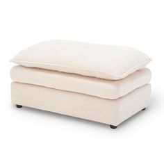 two white pillows stacked on top of each other