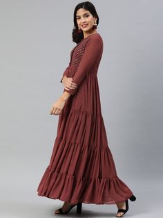 Adorable Maroon Solid Fit and Flare Dress With Embellishment is specifically designed to make your look perfect on festives. This dress featured Embroidered work detail Georgette dress fabric. Designer Wear Long Dress For Eid, Floor-length Embroidered Dress For Designer Wear, Anarkali Maxi Dress With Embroidery, Anarkali Style Embroidered Straight Kurta Maxi Dress, Embroidered Designer Maxi Dress, Festive Long Sleeve Maxi Dress, Semi-stitched Anarkali Long Dress, Anarkali Embroidered Semi-stitched Maxi Dress, Festive Straight Kurta Dress For Eid