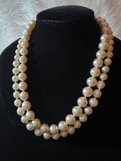 "Wonderful Majorica pearl choker necklace, double strand, one strand has a 14\" long with 8.23mm pearl and the 2nd strand and the longest measure 16\"long and the pearl has  6.63 mm (please see the picture 8 & 9) with the caliper . The necklace is in excellent pre-owner condition it's a little pearl on the box clasp and each pearl are hand knotted in the between of each one , this beautiful necklace is creamy white and is mark pm70 on the back of the clasp. Pearl are timeless,Majorica pearl are Formal Multi-strand Beaded Pearl Necklace, Formal Beaded Double Strand Pearl Necklace, Formal Double Strand Beaded Pearl Necklace, Classic Double Strand Beaded Necklaces, Vintage Pearl Necklace With Round Beads, Classic Double Strand Beaded Necklace, Classic Double Strand Pearl White Necklace, Double Strand Pearl Necklace For Formal Occasions, Formal Double Strand Pearl Necklace With Pendant