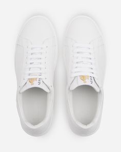 Ddb0 Leather Sneakers - All Sale products are Final Sale and not eligible for exchange or return. This collection once again features the timeless DDB0 sneaker, with the Lanvin logo embroidered in tone-on-tone on the heel counter. This new design, with its simple lines, works well with either formal or casual wear. - Product color: White/white White Lace-up Sneakers With Logo Plaque, Designer White Sneakers With Embossed Logo, Classic White Custom Sneakers With Embossed Logo, Luxury White Sneakers With Logo Plaque, Casual Sneakers With Logo Plaque And White Sole, White Custom Leather Sneakers With Embossed Logo, Casual Sneakers With Logo Plaque, Classic White Custom Sneakers With Logo Detail, Luxury White Sneakers With Contrast Sole