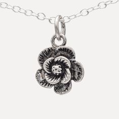 "Uncover the sublime elegance of our 925 Sterling Silver Rose Flower Pendant Necklace. The necklace features a meticulously crafted pendant with a design inspired by the timeless beauty of a blooming rose. Measuring 0.39\"x0.39\" (10x10mm), this small but impactful pendant exudes understated luxury, promising to bring a touch of sophistication to any outfit. Its fine detailing and high-quality material reflect our commitment to craftsmanship, ensuring that you get a jewelry piece that is both du Elegant Rose Flower Pendant Charm Necklaces, Classic Silver Necklace With Flower Shape, Sterling Silver Charm Necklace With Flower Pendant, Silver Flower Pendant Jewelry With Rose Design, Sterling Silver Charm Necklaces With Flower Pendant, Sterling Silver Charm Necklace With Flower Charm, Rose Pendant Necklace In Sterling Silver, Sterling Silver Flower Charm Necklace With Pendant, Sterling Silver Necklaces With Flower Pendant Charms