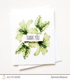 a thank you card with watercolor flowers on it