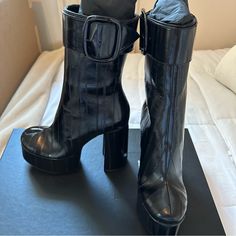 Beautiful Pair Of Saint Laurent Billy 85 Platform Booties. Black Pannelli Anguilla Leather. 5.25 Inch Heel On 2.25 Inch Platform (Equivalent To 3 Inch Heel). Slightly Below Mid-Calf With Inner Zipper And Buckle Closure On Top. Size 38.5. Brand New. Never Worn. Please See Photos For More Details. Contact Me With Any Questions You May Have. Cleaning Out My Overloaded Closet. Please Check Out My Other Listings. Luxury High Heel Platform Boots With Reinforced Heel, Luxury Platform Boots With Reinforced High Heel, Black Ankle Boots With Buckle Closure, Designer Patent Leather Heeled Boots With Reinforced Heel, Designer Patent Leather Heeled Boots For Party, Platform Heeled Boots With Pointed Toe In Patent Leather, Pointed Toe Patent Leather Platform Heeled Boots, Patent Leather Platform Heeled Boots With Pointed Toe, Evening Patent Leather Heeled Boots With Block Heel