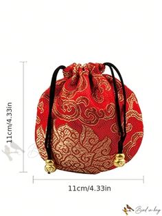 a red and gold bag on a white background with measurements for the bottom half of it