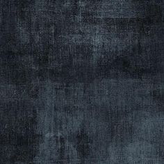 a dark blue background that is very textured and looks like it could be used as a wallpaper