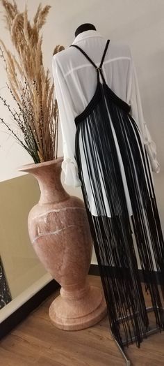 Fashion Festival Outfits, Chic Tassel Dresses For Festival, Chic Festival Dress With Tassels, Chic Tasseled Dresses For Festivals, Elegant Summer Festival Mini Dress, Bohemian Maxi Dresses For Night Out, Elegant Fringe Maxi Dress For The Beach, Bohemian Mini Dress For Party, Summer Party Dresses With Tassels