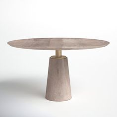 a round table with a gold base on a white background