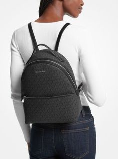 From gym sessions to city commutes, our Sheila backpack has you covered. The Signature Logo-print canvas style comes with a dedicated pocket inside for your tablet, as well as a front zip pouch for smaller items. Adjust the buckled \ straps on the back for the perfect drop. Coated Canvas Backpack With Zipper Closure For On-the-go, Casual Coated Canvas Backpack, Casual Travel Backpack With Logo, Modern Everyday Backpack With Logo, Casual Logo Backpack For Everyday Use, Casual Everyday Backpack With Logo, Trendy Travel Backpack With Logo, Coated Canvas Backpack With Zipper For School, Back To School Travel Backpack With Logo