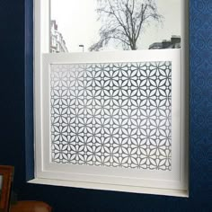 an image of a window in the wall that is cut out to look like a flower pattern