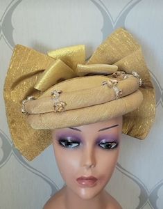 Beautiful Auto gele/headpiece for that upcoming occasion or event, suitable for wedding parties, bridesmaids outfits, engagement ceremony, owanbe, Igbo hausa wedding, Nigerian African wedding party, 40th birthday outfit, 50th birthday African dress etc. Message for preorder. Gold Sets For Party Season, Gold Party Wear Sets For Evening, Glamorous Gold Party Sets, Elegant Gold Party Season Sets, Glamorous Wedding Sets For Party Season, Royal Fitted Party Sets, Gold Sets For Festive Evening Occasions, Party Wear Sets For Wedding And Party Season, Gold Party Wear Sets For Wedding