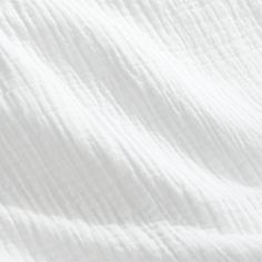 an image of white linen textured on top of each other