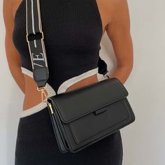 The ultimate versatile crossbody bag - its simplistic elegance allows it to be taken from day to night with ease. Step out with confidence anywhere you go. Features Made of premium leather material, ensuring durability and longevity Multiple pockets for organization and easy access to essentials Sophisticated design, perfect for both formal and casual occasions, making it a versatile accessory Specifications Length 19cm x Width 6cm x Height 8cm Black Crossbody Shoulder Strap, Timeless Black Crossbody Flap Bag, Sleek Black Crossbody Bag, Black Crossbody Shoulder Bag With Chain Strap, Black Leather-lined Crossbody Bag, Valentina Rose, Tan Handbags, Stepping Out, Sophisticated Design