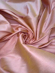 Two tone dupion polyester fabric This beautiful two-tone baby pink/gold soft dupion polyester fabric is perfect for creating stunning dresses, coats, jackets, and other apparel items. With a width of 58 inches, this fabric is also suitable for use in upholstery, bedding, and crafts. Made from a luxurious blend of polyester raw silk, this fabric has a silk fibre content that gives it a soft and elegant feel. The fabric is ideal for use in creating high-quality apparel that is both comfortable and Rose Gold Fabric, Casual Everyday, Everyday Dresses, Raw Silk, Stunning Dresses, Dress Fabric, Baby Pink, Pink And Gold, Two Tone