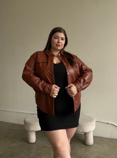 An instant classic, our new Plus Size PU Leather Shirt Jacket has a luxurious aesthetic and feel. Crafted in an oversized fit and constructed from premium PU leather, it ensures effortless style and comfort all day long. The double pockets at the front and slightly oversized design offer a elegantly timeless look that will last for seasons to come. This shirt features a buttery soft PU leather, double pockets on the front, snap buttons down the front, a folded-down collar, and an oversized fit. Caramel Jacket Outfit, Curvy Going Out Outfits, Leather Shirt Jacket, Luxurious Aesthetic, Plus Size Outerwear, Leather Shirt, Autumn Fashion Casual, Going Out Outfits, Chunky Knits Sweater