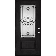 a black door with glass panels and wrought iron grills on the front side panel