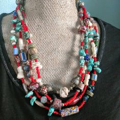 Loads of color in this handmade necklace with vintage American turquoise beads and a wide variety of beautiful African trade beads from the early 1900s.  Some might be older than that.  I finished it off with a beautiful filigree sterling silver clasp.   Bring history back to life with this timeless piece and get it for her now! VJR#519  Ready to ship immediately. Be sure to allow adequate time for delivery if this is a gift item. If you would like to see more unique items in VintageJewelsReborn, google  https://www.etsy.com/shop/VintageJewelsReborn Mexican Silver Jewelry, Vintage Jewelry Bracelets, Artisan Necklace, African Trade Beads, Chunky Jewelry, American Turquoise, Upcycled Jewelry, Trade Beads, Amber Jewelry