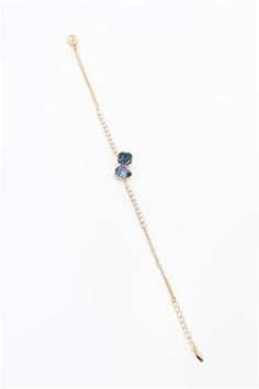 Introducing our stunning gold color and blue stone bracelet, meticulously designed for modern urban women who embrace both style and sophistication. Crafted with attention to detail, this elegant accessory effortlessly captures the essence of contemporary fashion. The shimmering gold color beautifully complements the vibrant blue stone, creating a mesmerizing combination that is sure to turn heads. Whether worn for a night out or simply to elevate your everyday ensemble, this bracelet adds a touch of glamour to any look. Treat yourself or surprise a loved one with this captivating piece, designed to make a statement and elevate your jewelry collection. Elegant Adjustable Blue Gold Bracelet, Elegant Blue Adjustable Gold Bracelet, Elegant Blue Bracelets With Adjustable Chain, Adjustable Blue Chain Bracelet For Party, Blue Stone Bracelet, Color Bracelet, Wedding Jewelry Bracelets, Wedding Bracelets, Modern Urban