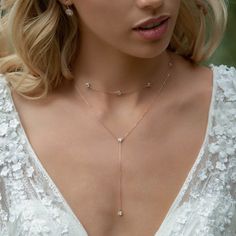 bridal jewelry, Swarovski necklace, bridal necklace, wedding necklace Handmade in NYC, please allow for 10-15 business days of crafting time. EXPEDITE ORDERS: Choose 5-day crafting time in pull-down menu and choose expedited shipping when checking out. ► Spend $200 | Receive 10% OFF Your Order with Code: 10OFF200 ► Please note in your order when your wedding date is MATERIALS + MEASUREMENTS: - .925 Sterling Silver or 14k Rose Gold/ 14K Gold over .925 Sterling Silver - Cubic Zirconia crystals 5 M Rose Gold Diamond Necklace With Adjustable Chain For Wedding, Elegant Cubic Zirconia Backdrop Necklace With Delicate Chain, Delicate Clavicle Chain Bridal Necklace For Formal Occasions, Delicate Diamond Necklace With Adjustable Chain For Wedding, Delicate Rose Gold Diamond Necklace For Wedding, Crystal Clavicle Chain Backdrop Necklace For Wedding, Crystal Backdrop Necklace With Clavicle Chain For Wedding, Rose Gold Solitaire Necklace With Delicate Chain For Wedding, Delicate Rose Gold Solitaire Necklace For Wedding