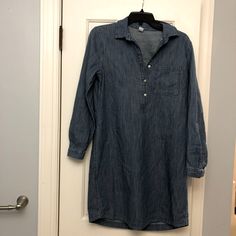 Brand New Old Navy Denim Shirt Dress. Button Down With Collar And Cuff Sleeves. Never Worn! Indigo Button-up Cotton Denim Dress, Long Sleeve Light Wash Denim Workwear Dress, Light Wash Long Sleeve Denim Work Dress, Long Sleeve Light Wash Denim Dress For Work, Light Wash Long Sleeve Denim Dress For Work, Casual Fitted Denim Dress With Button Cuffs, Casual Light Wash Long Sleeve Denim Dress, Casual Long Sleeve Denim Dress For Work, Casual Indigo Dress With Buttons