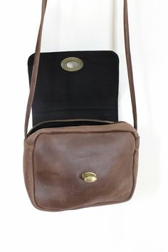 Brown Shoulder Bag With Cell Phone Pocket, Brown Shoulder Bag With Cell Phone Pocket For Everyday, Brown Crossbody Satchel With Cell Phone Pocket, Vintage Brown Crossbody Bag For Everyday, Vintage Brown Everyday Crossbody Bag, Everyday Vintage Brown Crossbody Shoulder Bag, Vintage Brown Bag With Removable Pouch For Everyday Use, Everyday Use Vintage Brown Bag With Removable Pouch, Brown Crossbody Shoulder Bag For Everyday Use