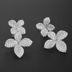 Features a paved 4-Petal Flower Earrings with simulated diamonds *100% 925 Sterling Silver *Weight: 6.24g *Length: 29.5mm *18K White, Yellow & Rose Gold Plated available *Nickel and Lead Free *Luxury Statement Earrings *Includes free gift box ⚜️This specific jewelry is made to order. The production time is about 10 days, and the transportation takes 5-8 days. ⚜️Strictly NO RETURNS as we produce according to the customer's order and we conduct stringent inspections on all finished products. Thank you for visiting my shop and I hope you found what you were looking for. Please feel free to message me for any questions prior to purchasing. You can also follow us on instagram☺️@xplicitluxe Enjoy FREE SHIPPING on EVERY PURCHASE 24/7/365!📦 Petal Flower, Flower Leaf, Elegant Flowers, Party Jewelry, Multi Stone, 8 Days, Yellow Rose, Cz Stone, Wedding Earrings