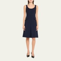 Oscar de la Renta dress with an inverted pleat Scoop neckline Sleeveless Hip flap buttoned pockets Knee length A-line silhouette Back zip Virgin wool/elastane/nylon/polyamide Dry clean Made in Italy Flattering A-line Sleeveless Dress For Work, Classic Sleeveless Dress With Pockets, Elegant Sleeveless Midi Dress With Pockets, Chic A-line Sleeveless Dress With Pockets, Elegant Sleeveless A-line Dress With Pockets, Formal Sleeveless Dress With French Seams, Elegant A-line Sleeveless Dress With Pockets, Elegant Fitted Sleeveless Dress With Pockets, Workwear Sleeveless Midi Dress With Pleated Bodice