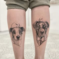 two dogs are shown on the legs of a woman's legs, both with their faces