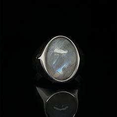 The elegant, smooth-textured Moonstone gemstone is much more than an eye-catching jewelry stone. It is said to have immense healing and spiritual properties.  Those purchasing these pieces will not only have the satisfaction of owning and wearing something special, but also allowing someone to continue creating something that they love. Tim's Silver gives you the meaning and the properties of this gemstone ring. PRODUCT DETAILS Metal : 925k Sterling Silver  Stone : Moonstone ( 13×18 mm ) Style: Modern Oval Moonstone Ring With Large Stone, Handmade Modern Oval Moonstone Ring, Modern Handmade Oval Moonstone Ring, Handmade Oval Moonstone Ring In Modern Style, Mystical Moonstone Ring For Healing With Natural Stones, Mystical Open Moonstone Ring, Modern Moonstone Gemstone Rings, Natural Stones Moonstone Open Ring, Large Stone Moonstone Ring