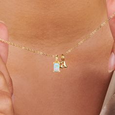 The personalized initial necklace with birthstone is an elegant, unique necklace and perfect as a personalized gift for her. Your choice of gold-plated or silver lowercase initials ( a-z ) or uppercase initials (A -Z ) and birthstone(s) that hangs on a delicate 18-inch cable chain, you can also add one or many more letters to your necklace.  You can add as many initials and/or birthstones to the necklace by purchasing the add on charms  option on the link below: https://www.etsy.com/listing/1746 Dainty Name Necklace With Birthstone Initial Pendant, Anniversary Birthstone Necklace With Initial Pendant, Elegant Initial Pendant Birthstone Necklace For Birthday, Dainty Gold Birthstone Necklace With Initials, Dainty Birthstone Initial Necklace For Gift, Dainty Initial Pendant Name Necklace With Birthstone, May Birthstone Necklace With Initial Pendant For Birthday, Personalized Dainty Birthstone Necklace With Initial Pendant, Initial Pendant Necklace With Birthstone For Personalized Gift