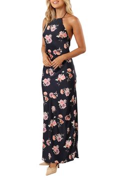 A blooming floral print enhances the romantic feel of a streamlined halter dress that's ready for your next occasion. Back button closure; ties at neck and back Halter neck Lined 100% polyester Hand wash, line dry Imported Garden Party Dress With Floral Print And Strappy Back, Chic Backless Dress With Floral Print For Spring, Halter Neck Fitted Backless Dress For Garden Party, Elegant Halter Neck Maxi Dress With Floral Print, Fitted Halter Neck Backless Dress For Garden Party, Feminine Floral Print Halter Dress For Spring, Floral Print Backless Dress For Beach In Spring, Chic Floral Print Halter Dress For Garden Party, Backless Floral Print Dress For Beach In Spring