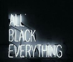 a neon sign that says all black everything