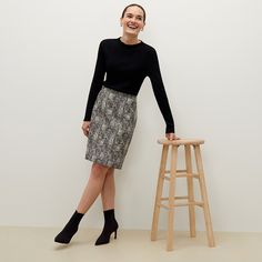 Simple and sleek, this versatile skirt is made from a structured Italian jacquard that references classic menswear prints— houndstooth, plaid—but is decidedly more chic. It hits at the low waist and is constructed to flatter the hips. Perfect for pairing with a silky blouse or cozy knit. Houndstooth Pencil Skirt For Work, Tailored Elegant Winter Skirt, Tailored Elegant Skirt For Winter, Winter Workwear Mini Pencil Skirt, Spring Workwear Skirt With Houndstooth Pattern, Fitted Pencil Skirt For Formal Fall Events, Elegant Tailored Winter Skirt, Semi-formal Lined Skirt For Fall, Elegant Black Skirt With Houndstooth Pattern