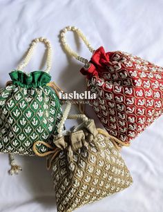 Beautiful designer handmade potli bags that go well with any Indian wear like saris, lehengas, anarkalis, suits  etc. Hand embroidered with white sequin and pearl, and gold kad-dana work. The embroidery is only at the front. The back is a plain solid color.   SHIPPING DETAILS  Our shop is based in India. We ship domestically as well as internationally. For international orders, free shipping is available via India Post and it takes about 15-20 business days to deliver. Faster shipping is available for 25 USD via Speed post and it will take about a week to deliver.  For domestic orders, shipping is free. And once an item is dispatched, it will take about a week to deliver.  DISCLAIMER  The actual color of the product might slightly differ from the image due to photographic lighting or monit Multicolor Rectangular Bag With Dori Work, Multicolor Shoulder Bag With Dori Work For Festivals, Festive Multicolor Shoulder Bag With Dori Work, Festive Multicolor Shoulder Bag For Gift, Multicolor Pouch Bag With Dori Work, Multicolor Shoulder Bag With Zari Work For Festive, Festive Multicolor Shoulder Bag With Zari Work, Festive Multicolor Bags With Dori Work, Multicolor Festive Shoulder Bag As A Gift